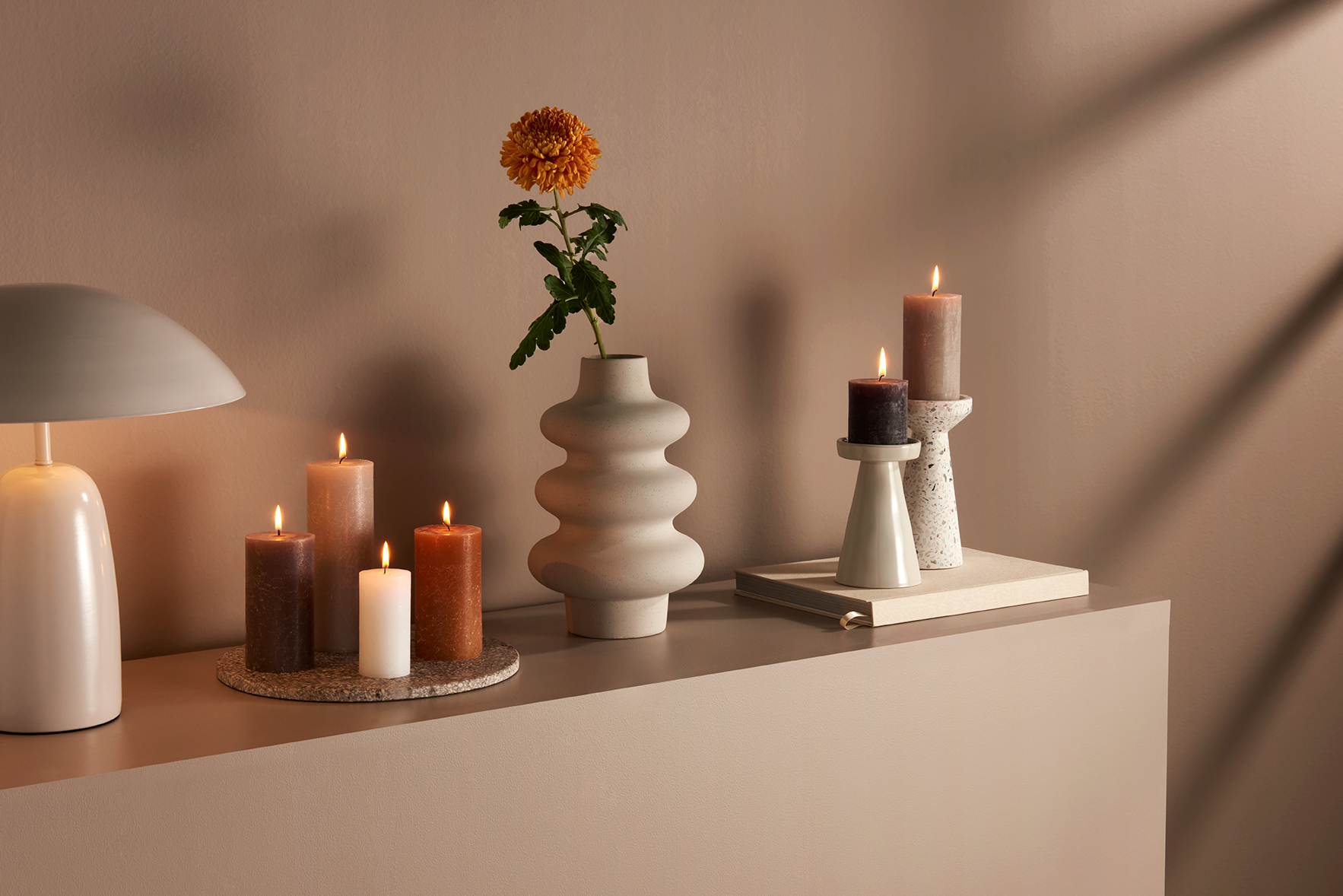 Professional retouching for Bolsius candles - enhanced product photography with neutral styling